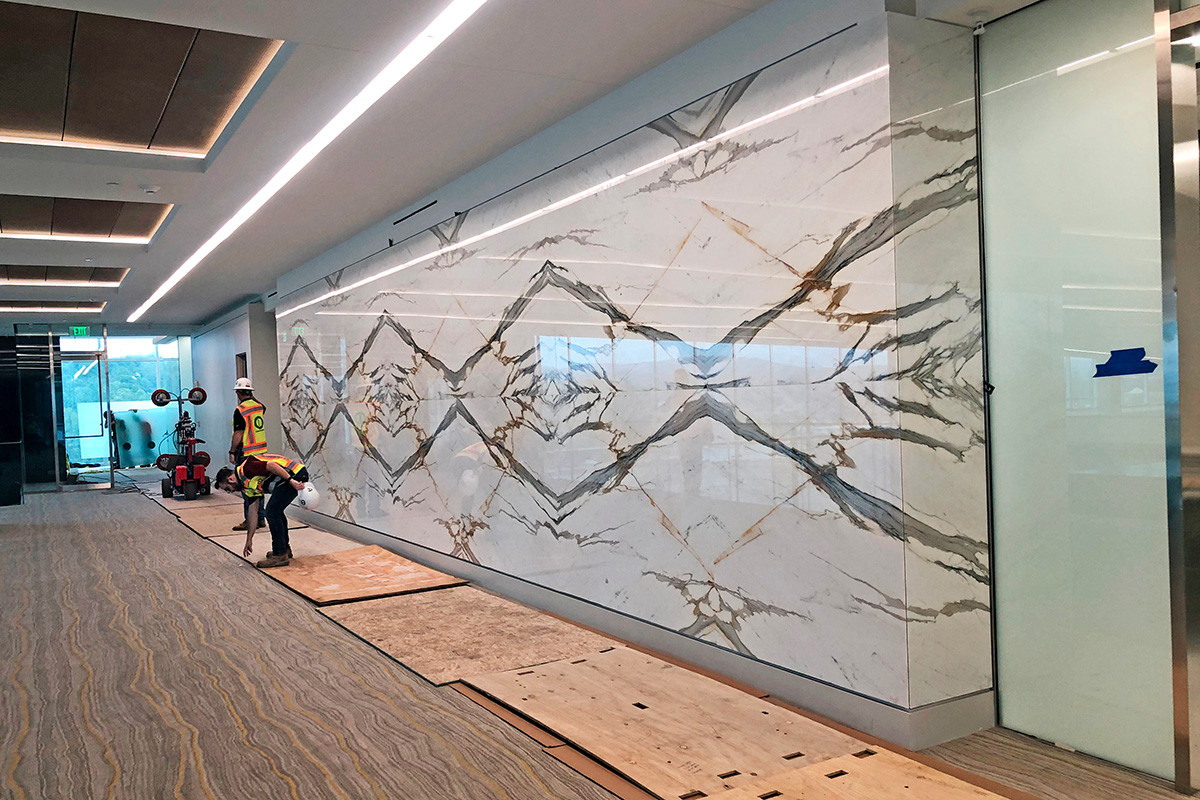 Creative cuts of polished marble from South America, Asia and Europe are displayed as natural art pieces.
