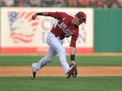 Reynolds Takes Matters Into Own Hands, Hogs Win Before 10,512 Fans