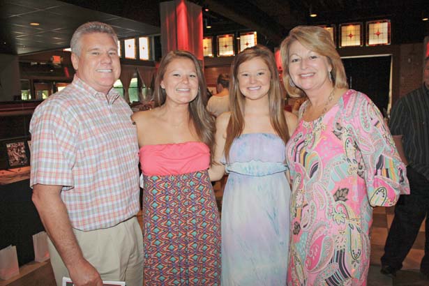 Johnny and Julia Washburn with their daughters, Haley and Hannah Washburn (center)