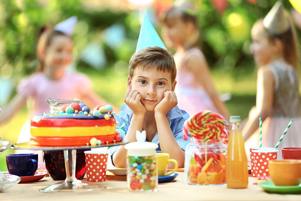 boy at birthday party shutterstock 479604991